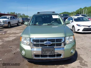 2009 Ford Escape Hybrid with VIN 1FMCU493X9KA56174, listed as a IAAI auction lot 39435925 with 158,171 mi miles. Bid and sale history available at carsss.com. Image 12.