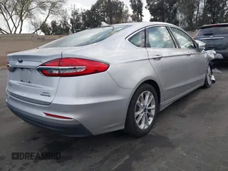 2019 Ford Fusion Hybrid SEL with VIN 3FA6P0MU3KR262056, listed as a IAAI auction lot 41643020 with 1 mi miles. Bid and sale history available at carsss.com. Image 4.