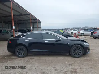 2018 Tesla Model S 75D with VIN 5YJSA1E22JF282828, listed as a IAAI auction lot 41595543 with 72,571 mi miles and . Bid and sale history available at DreamBid. Image 12.