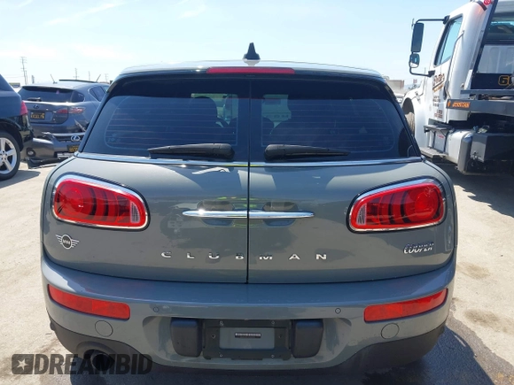 2019 MINI Clubman Cooper with VIN WMWLN5C57K2E34894, listed as a IAAI auction lot 42072962 with 49,274 mi miles and . Bid and sale history available at DreamBid. Image 16.