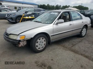 1997 Honda Accord LX with VIN JHMCD5639VC013771, listed as a Copart auction lot 65196535 with 192,570 mi miles and Salvage title. Bid and sale history available at DreamBid. Image 1.
