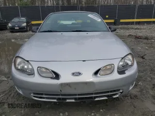2002 Ford Escort ZX2 Standard z VIN 3FAFP11352R155043, wystawiony jako Copart lot #51356535 z przebiegiem 71 224 mil mil oraz Szkoda całkowita • Salvage title. Historia ofert i sprzedaży dostępna na DreamBid. Obrazek 5.