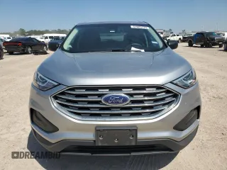 2020 Ford Edge SE z VIN 2FMPK3G91LBA11070, wystawiony jako Copart lot #51683775 z przebiegiem 72 511 mil mil oraz Czysty tytuł • Clean title. Historia ofert i sprzedaży dostępna na DreamBid. Obrazek 5.