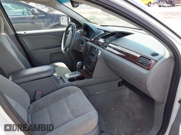 2007 Ford Five Hundred SEL z VIN 1FAHP24107G144667, wystawiony jako IAAI lot #41606069 z przebiegiem Nie podano mil oraz . Historia ofert i sprzedaży dostępna na DreamBid. Obrazek 5.
