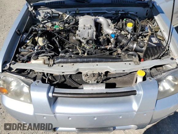 2002 Nissan Frontier z VIN 1N6MD29X62C380509, wystawiony jako Copart lot #50418365 z przebiegiem 223 541 mil mil oraz Czysty tytuł • Clean title. Historia ofert i sprzedaży dostępna na DreamBid. Obrazek 11.