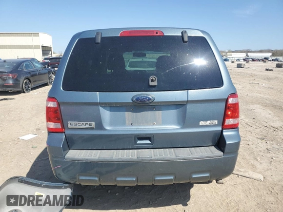 2010 Ford Escape XLS с VIN 1FMCU0C71AKC79020, выставлен на аукционе Copart как лот 52207675 с пробегом 188 415 миль миль и Списание • Salvage title. История ставок и продаж доступна на DreamBid. Изображение 6.