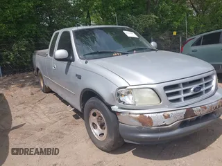 2001 Ford F-150 with VIN 2FTZX17221CB01390, listed as a IAAI auction lot 42194407 with 239,834 mi miles and . Bid and sale history available at DreamBid. Image 1.