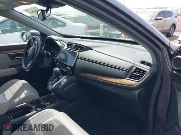 2017 Honda CR-V EX-L with VIN 7FARW1H89HE002384, listed as a IAAI auction lot 41908640 with 131,229 mi miles. Bid and sale history available at carsss.com. Image 5.