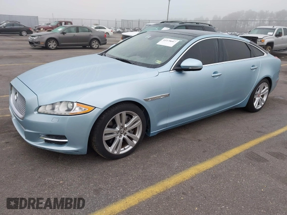 2013 Jaguar XJ with VIN SAJWA2G13DLV57881, listed as a IAAI auction lot 41478667 with 73,764 mi miles. Bid and sale history available at carsss.com. Image 2.