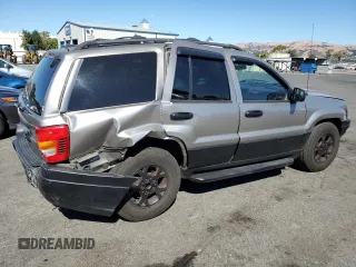 1999 Jeep Grand Cherokee Laredo with VIN 1J4GW58N4XC739465, listed as a Copart auction lot 76130544 with 195,649 mi miles and Salvage title. Bid and sale history available at DreamBid. Image 3.