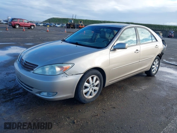 2004 Toyota Camry LE with VIN 4T1BF30K24U577908, listed as a IAAI auction lot 41591147 with 151,678 mi miles and . Bid and sale history available at DreamBid. Image 18.