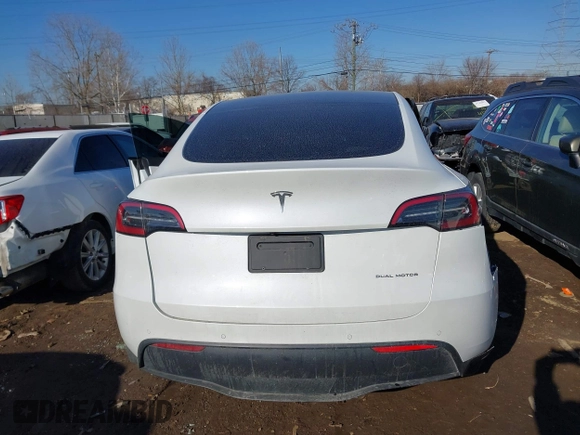 2021 Tesla Model Y Long Range with VIN 5YJYGDEE5MF203175, listed as a IAAI auction lot 41758334 with 63,387 mi miles and . Bid and sale history available at DreamBid. Image 16.