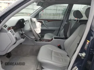 2002 Mercedes-Benz E-Class with VIN WDBJF82J62X063720, listed as a Copart auction lot 84763074 with 0 mi miles and Salvage Title. Bid and sale history available at carsss.com. Image 7.