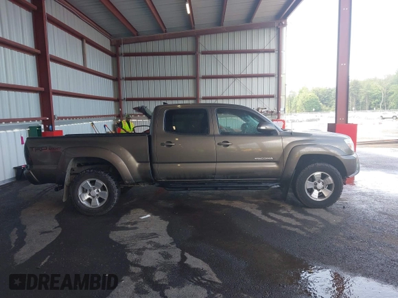 2014 Toyota Tacoma with VIN 3TMMU4FN4EM072128, listed as a IAAI auction lot 42479725 with 287,877 mi miles and . Bid and sale history available at DreamBid. Image 13.