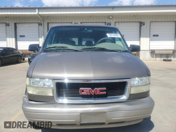 2003 GMC Safari z VIN 1GKDM19XX3B514754, wystawiony jako Copart lot #50744805 z przebiegiem 142 216 mil mil oraz Szkoda całkowita • Salvage title. Historia ofert i sprzedaży dostępna na DreamBid. Obrazek 5.