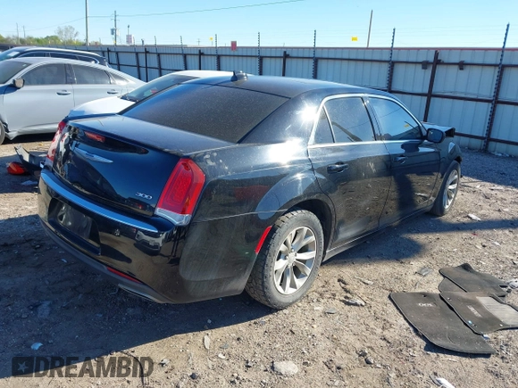 2016 Chrysler 300 Anniversary Edition with VIN 2C3CCAAGXGH261376, listed as a IAAI auction lot 41833894 with 64,489 mi miles and . Bid and sale history available at DreamBid. Image 4.
