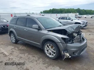 2012 Dodge Journey Crew with VIN 3C4PDCDG1CT304974, listed as a IAAI auction lot 42243191 with 166,197 mi miles and . Bid and sale history available at DreamBid. Image 1.