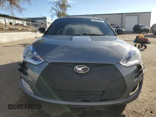 2013 Hyundai Veloster w/Black Int z VIN KMHTC6AD0DU135773, wystawiony jako Copart lot #41367875 z przebiegiem 96 487 mil mil oraz Szkoda całkowita • Salvage title. Historia ofert i sprzedaży dostępna na DreamBid. Obrazek 5.