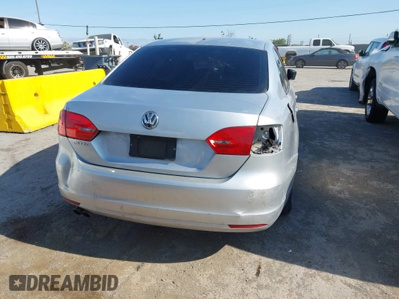 2014 Volkswagen Jetta S with VIN 3VW2K7AJ0EM391770, listed as a IAAI auction lot 42677433 with 200,032 mi miles and . Bid and sale history available at DreamBid. Image 13.