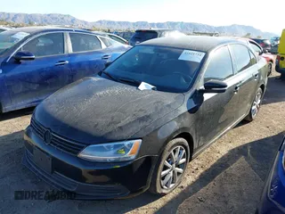 2012 Volkswagen Jetta Sedan SE w/Convenience with VIN 3VWDX7AJXCM069564, listed as a IAAI auction lot 41621734 with 155,649 mi miles. Bid and sale history available at carsss.com. Image 2.