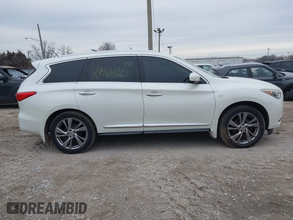 2015 Infiniti QX60 with VIN 5N1AL0MM5FC526488, listed as a IAAI auction lot 41511123 with 118,220 mi miles and . Bid and sale history available at DreamBid. Image 13.