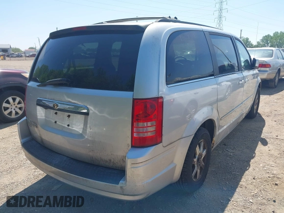 2008 Chrysler Town & Country Touring with VIN 2A8HR54P18R777245, listed as a IAAI auction lot 42241365 with 149,478 mi miles and . Bid and sale history available at DreamBid. Image 4.