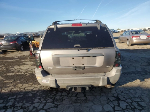 1999 Jeep Grand Cherokee Laredo with VIN 1J4GW58NXXC747537, listed as a Copart auction lot 87310234 with 0 mi miles and Salvage Title. Bid and sale history available at carsss.com. Image 6.