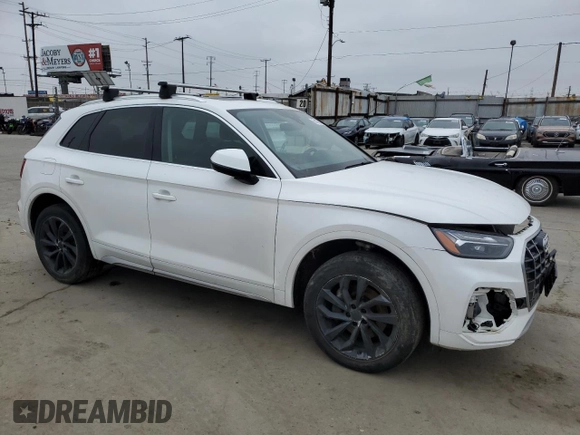 2021 Audi Q5 Premium Plus with VIN WA1BAAFY4M2021995, listed as a Copart auction lot 55136145 with 84,553 mi miles and Salvage Title. Bid and sale history available at carsss.com. Image 4.
