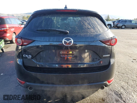 2021 Mazda CX-5 Touring with VIN JM3KFBCM5M1484465, listed as a Copart auction lot 44201845 with 23,777 mi miles and Salvage Title. Bid and sale history available at carsss.com. Image 6.