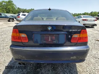 2004 BMW 3 Series 330xi with VIN WBAEW53434PN32840, listed as a Copart auction lot 57252165 with 213,458 mi miles and Clean title. Bid and sale history available at DreamBid. Image 6.