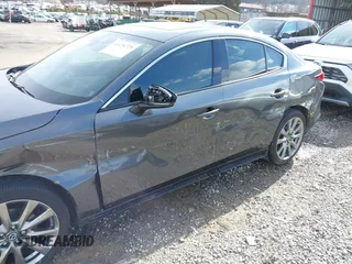 2023 Mazda 3 S Premium with VIN 3MZBPBDM8PM373434, listed as a IAAI auction lot 41234729 with 9,387 mi miles and . Bid and sale history available at DreamBid. Image 6.