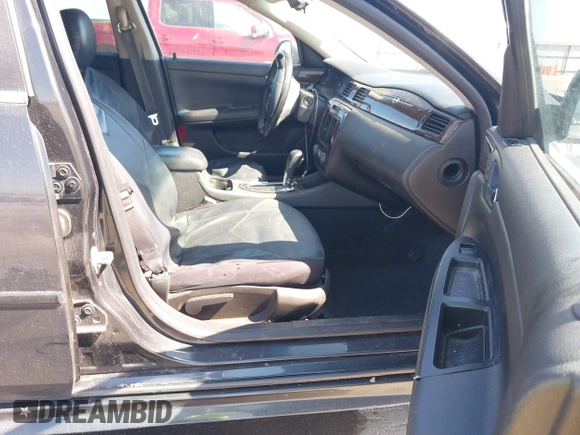 2013 Chevrolet Impala LT with VIN 2G1WB5E31D1163179, listed as a IAAI auction lot 41908130 with 190,801 mi miles and . Bid and sale history available at DreamBid. Image 5.