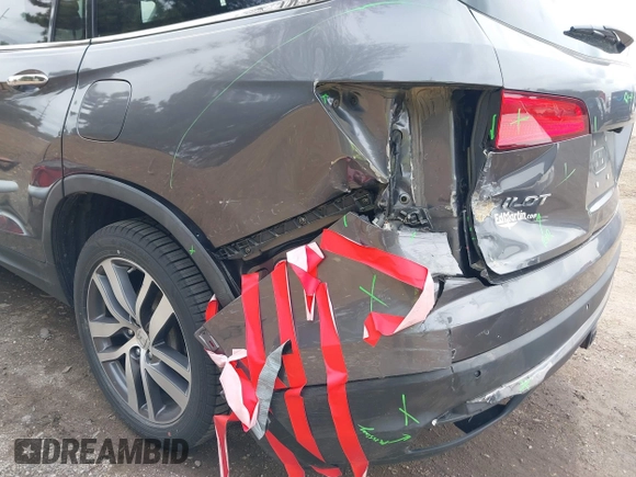 2017 Honda Pilot Touring with VIN 5FNYF6H92HB012090, listed as a IAAI auction lot 41882542 with 110,179 mi miles and . Bid and sale history available at DreamBid. Image 6.