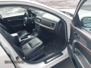 2012 Lincoln MKZ with VIN 3LNHL2JC3CR834133, listed as a IAAI auction lot 42031211 with 111,774 mi miles. Bid and sale history available at carsss.com. Image 5.