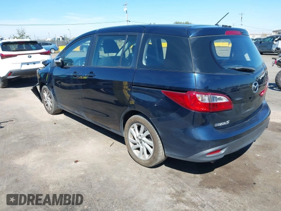 2014 Mazda 5 Sport with VIN JM1CW2BLXE0175975, listed as a IAAI auction lot 40278614 with 102,430 mi miles and . Bid and sale history available at DreamBid. Image 3.