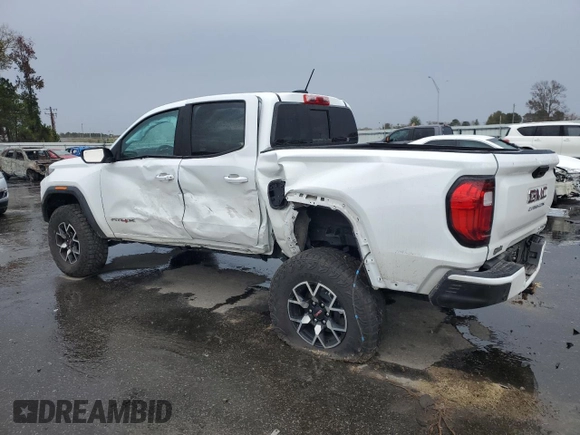 2024 GMC Canyon 4WD AT4X with VIN 1GTP6EEKXR1134879, listed as a Copart auction lot 80822964 with 12,567 mi miles and Salvage Title. Bid and sale history available at carsss.com. Image 2.