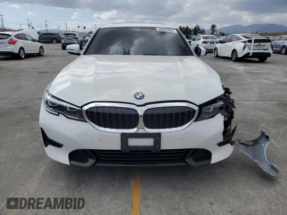 2022 BMW 3 Series 330i with VIN 3MW5R1J08N8C23042, listed as a Copart auction lot 56992485 with 43,693 mi miles and Salvage title. Bid and sale history available at DreamBid. Image 5.