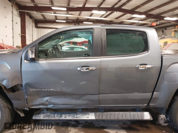 2021 GMC Canyon 4WD Denali with VIN 1GTG6EEN4M1287194, listed as a IAAI auction lot 41571729 with 21,704 mi miles. Bid and sale history available at carsss.com. Image 15.