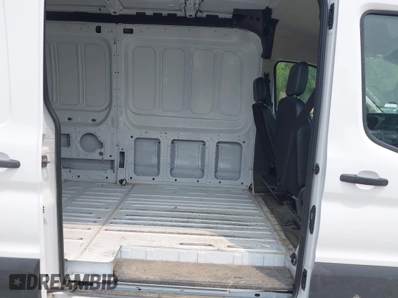 2024 Ford Transit Cargo with VIN 1FTBR2C82RKA72122, listed as a IAAI auction lot 42432209 with 26,806 mi miles and . Bid and sale history available at DreamBid. Image 8.