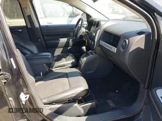 2014 Jeep Compass Latitude with VIN 1C4NJDEBXED551427, listed as a IAAI auction lot 41863047 with 75,913 mi miles. Bid and sale history available at carsss.com. Image 5.