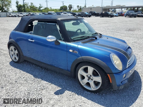 2006 MINI Convertible S with VIN WMWRH33566TK58973, listed as a Copart auction lot 51295575 with Not provided miles and Salvage title. Bid and sale history available at DreamBid. Image 4.