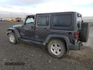 2018 Jeep Wrangler JK Unlimited Sport S with VIN 1C4BJWDG7JL814744, listed as a Copart auction lot 77830714 with 130,229 mi miles and Salvage Title. Bid and sale history available at carsss.com. Image 2.