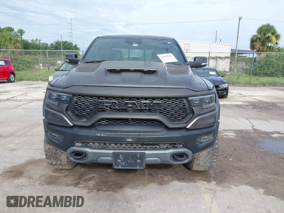 2021 Ram 1500 TRX with VIN 1C6SRFU98MN820577, listed as a IAAI auction lot 42652005 with 43,429 mi miles and . Bid and sale history available at DreamBid. Image 12.