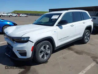 2022 Jeep Grand Cherokee with VIN 1C4RJYB66N8718018, listed as a IAAI auction lot 42002051 with Not provided miles and . Bid and sale history available at DreamBid. Image 2.