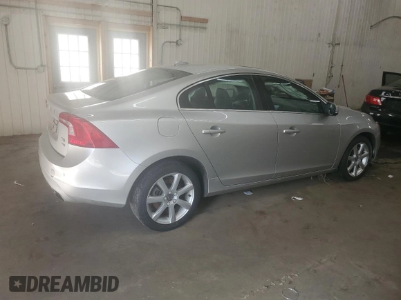 2016 Volvo S60 T5 Premier z VIN YV1612TK9G2393764, wystawiony jako Copart lot #53314985 z przebiegiem 112 858 mil mil oraz Szkoda całkowita • Salvage title. Historia ofert i sprzedaży dostępna na DreamBid. Obrazek 3.
