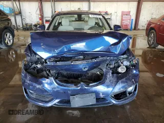 2015 BMW 2 Series 228i with VIN WBA1F5C54FVW98189, listed as a Copart auction lot 61815175 with 67,216 mi miles and Salvage title. Bid and sale history available at DreamBid. Image 5.