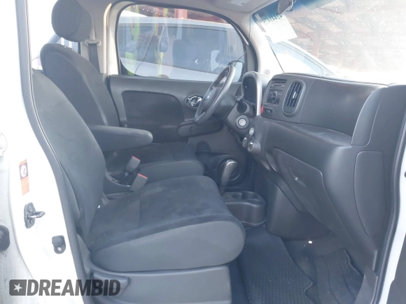 2009 Nissan Cube SL z VIN JN8AZ28R99T102860, wystawiony jako IAAI lot #42441475 z przebiegiem 151 466 mil mil oraz . Historia ofert i sprzedaży dostępna na DreamBid. Obrazek 5.