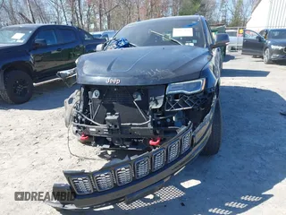2017 Jeep Grand Cherokee Trailhawk с VIN 1C4RJFLGXHC670469, выставлен на аукционе IAAI как лот 42055116 с пробегом 99 801 миль миль и . История ставок и продаж доступна на DreamBid. Изображение 6.