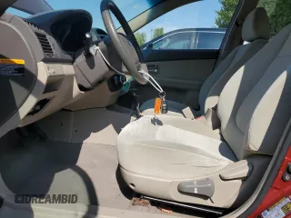 2007 Kia Spectra EX with VIN KNAFE121975376780, listed as a Copart auction lot 60738525 with 78,148 mi miles and Salvage title. Bid and sale history available at DreamBid. Image 7.