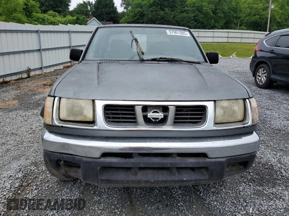 2000 Nissan Frontier XE with VIN 1N6ED27T2YC311037, listed as a Copart auction lot 57901285 with Not provided miles and Salvage title. Bid and sale history available at DreamBid. Image 5.